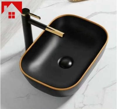 Lavabo đen viền vàng